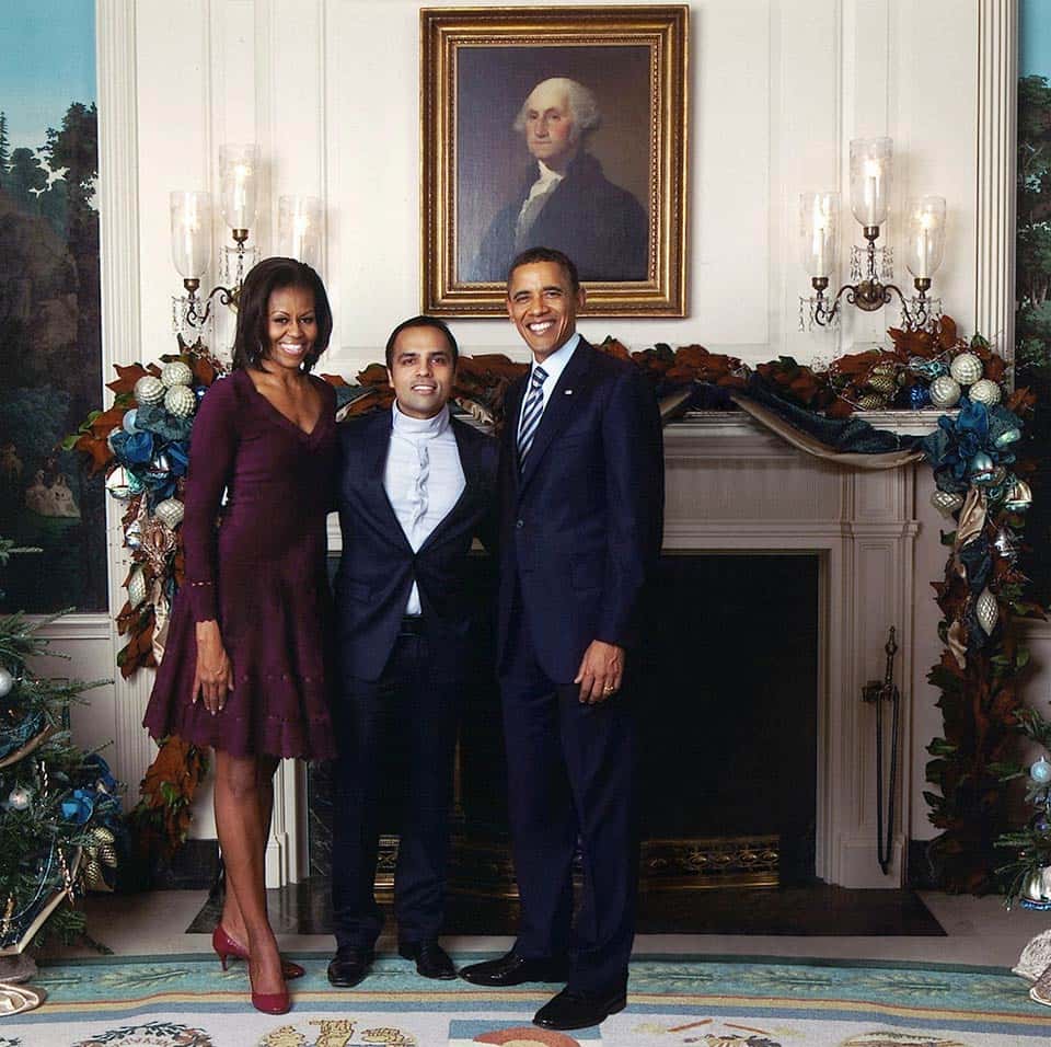 Gurbaksh Chahal with Michelle Obama and President Obama at the White House Christmas Party